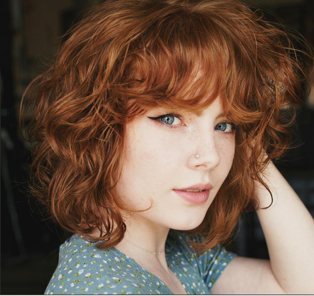 Copper shag with curly layers and full fringe