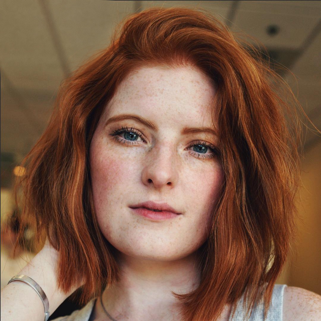 Copper bob with a swept-back part