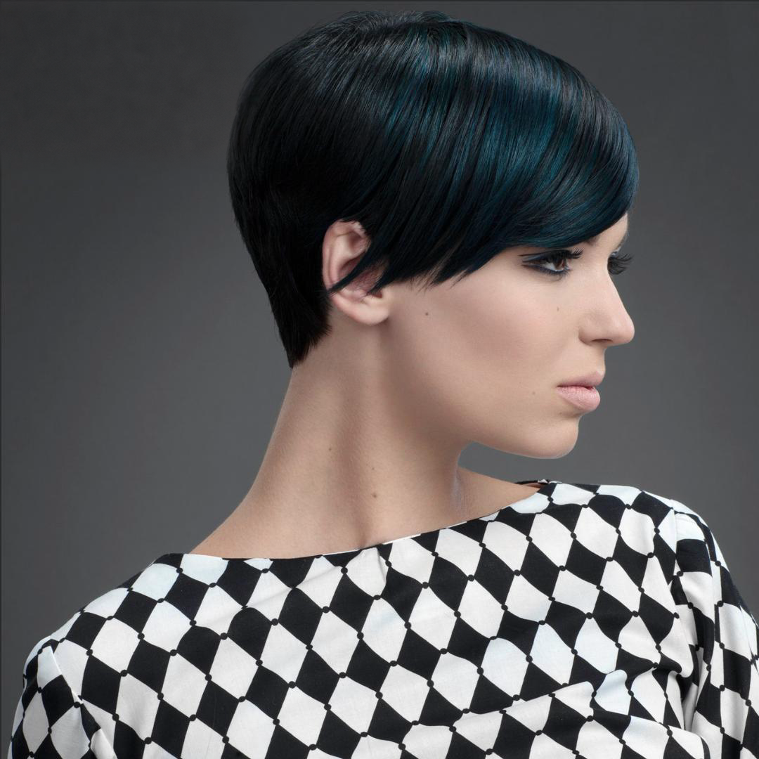Sleek dark pixie on a model wearing a black-and-white checkered shirt